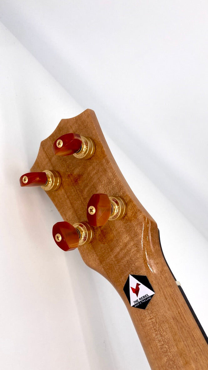 Rebel Creme brulee Concert Longneck gloss #11